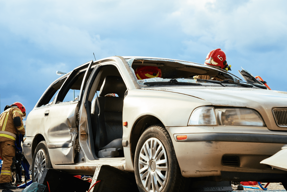 Auto wreck in Oxford where firefighters are getting victims to safety